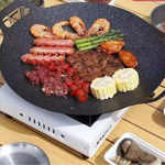 KoreaGrill Camp 360  Parrilla redonda 28–34 cm ideal para camping y cocción sin grasa.